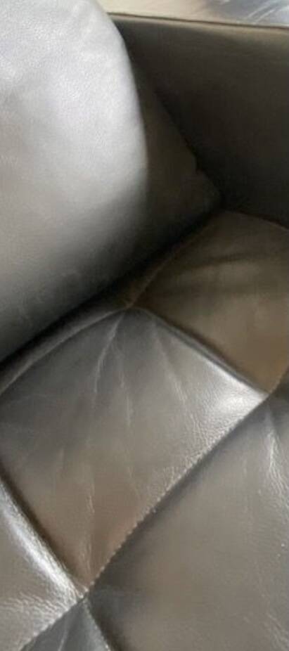 Ligne Roset black leather sofa