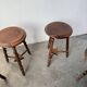 Set of 4 turned oak stools.