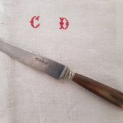 Twelve knives, horn handle, steel blade signed Philip CADET Marseille