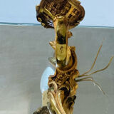 Louis XV bronze wall light with a flowing branch design and acanthus leaf decoration.