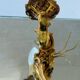Louis XV bronze wall light with a flowing branch design and acanthus leaf decoration.