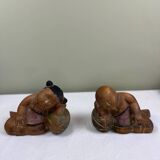 Serres-livres en bois sculpté