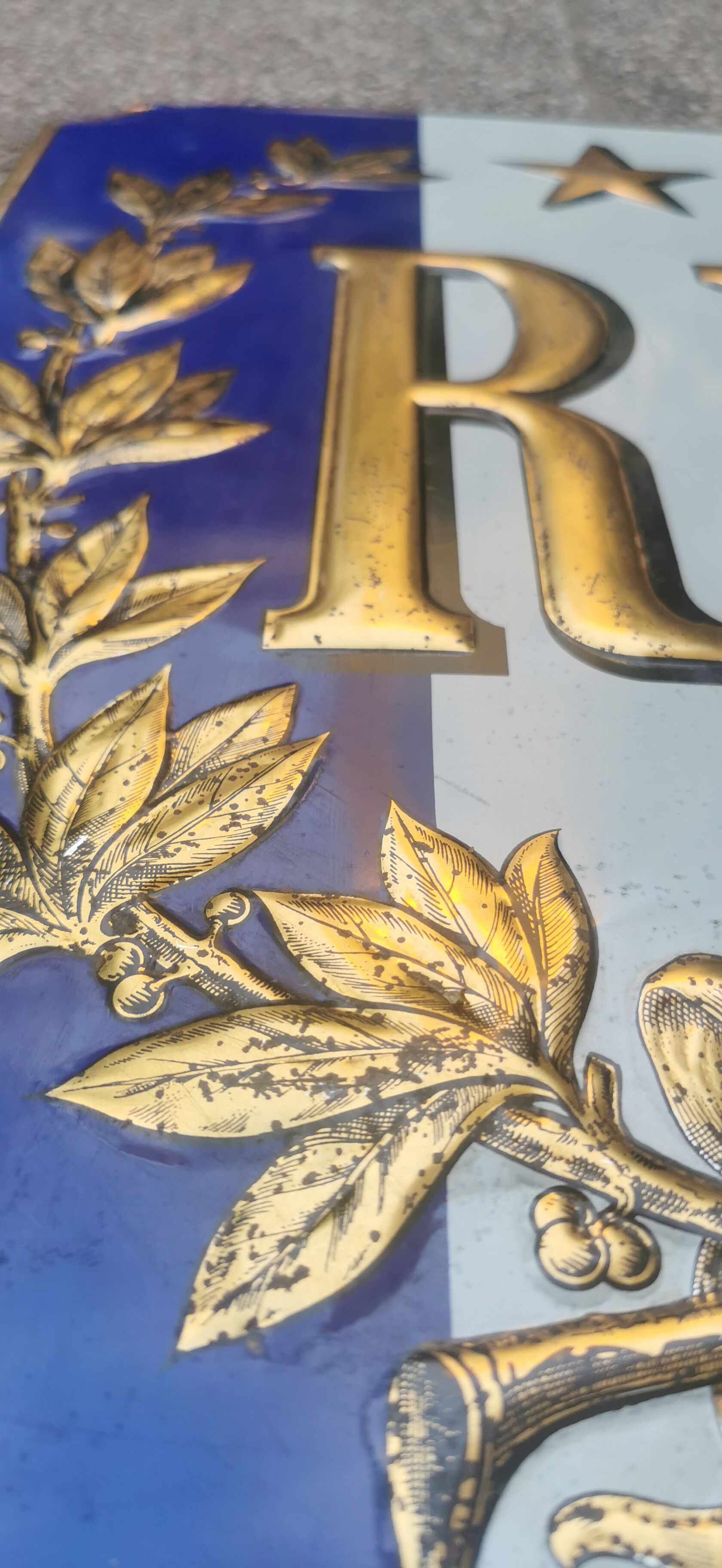 Sheet metal plate carries the flag of the French Republic