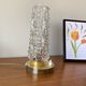 Vintage tulip-shaped table, desk, and bedside lamp with antique glass shade and brass base