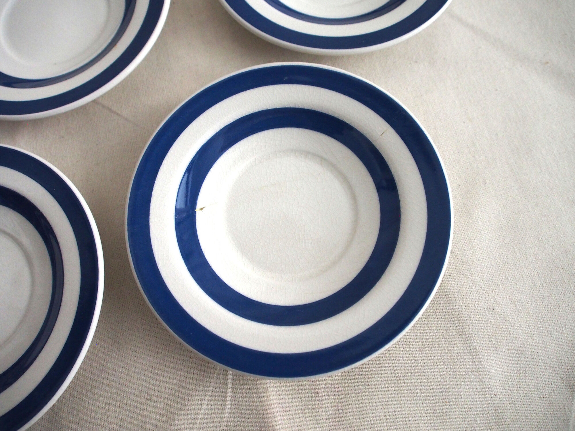 Series of 6 coffee cups in faience with blue stripes with saucers
