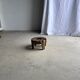 Small low circular four-legged stool in organic old teak with cut-out design H2