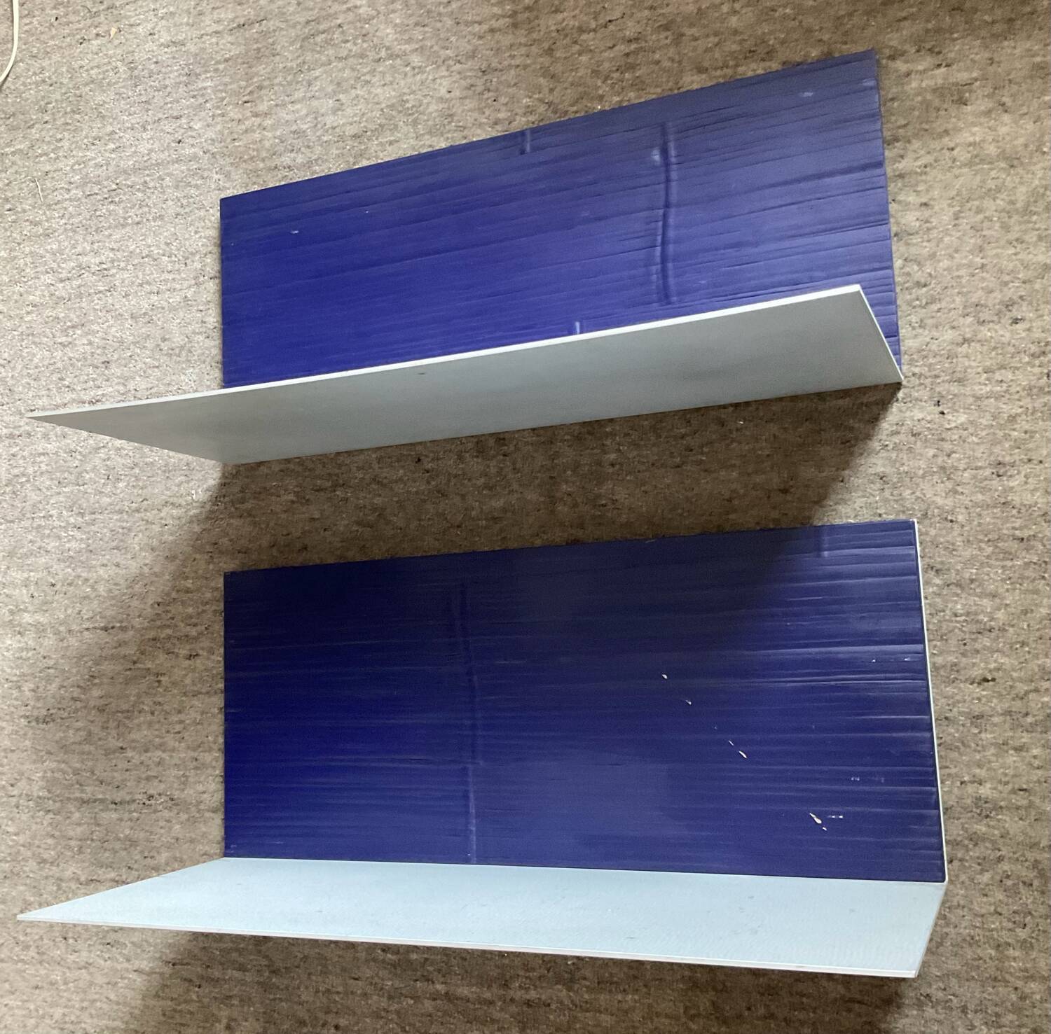 Pair of contemporary shelves in aluminum and stained wood