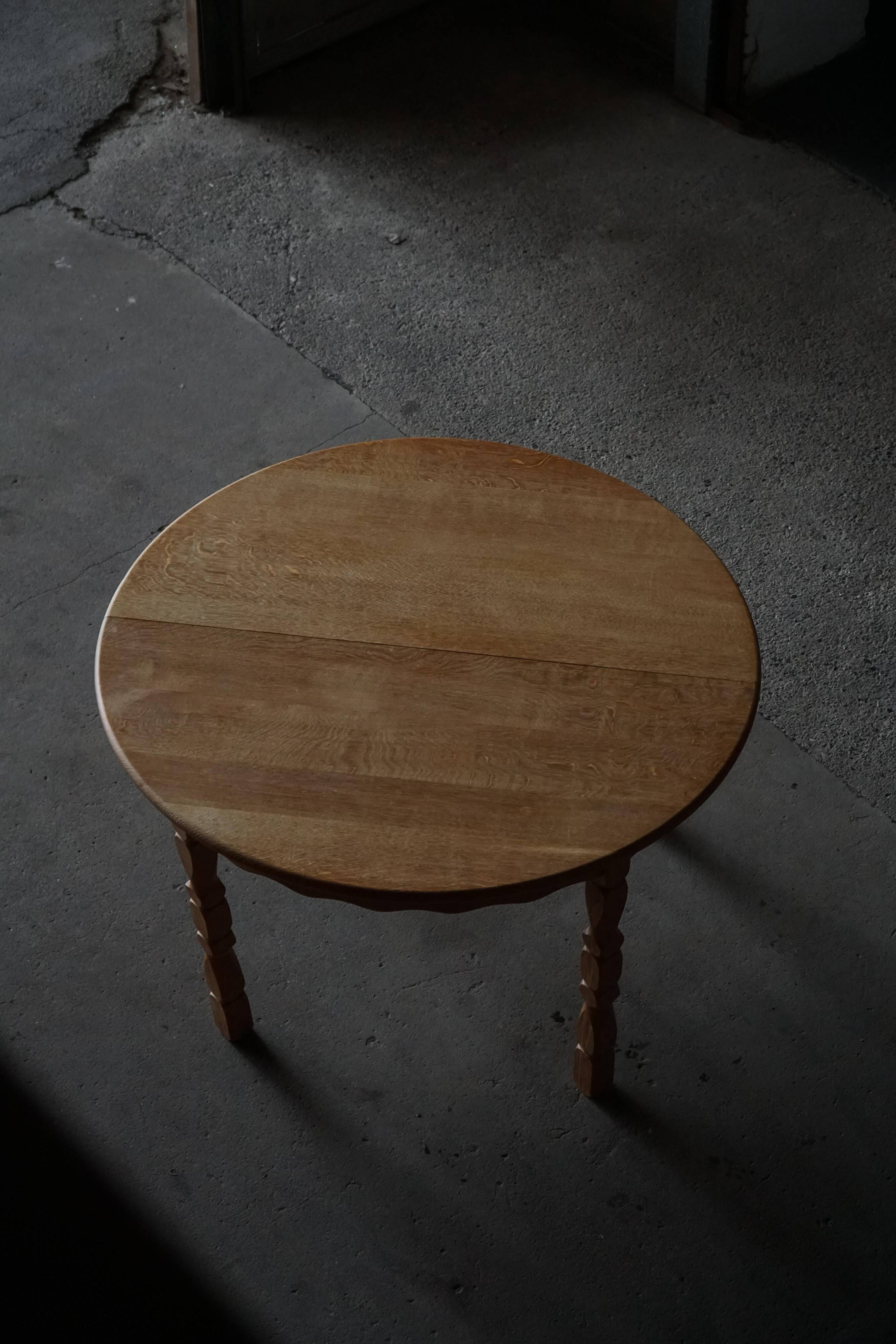 Table à manger ronde en chêne massif avec deux rallonges, milieu du siècle danois, années 1960