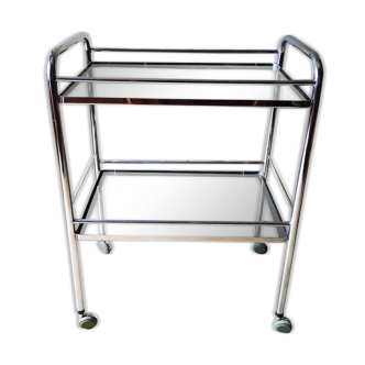 Serving in chrome and smoked glass