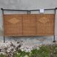Black metal and rattan bed frame