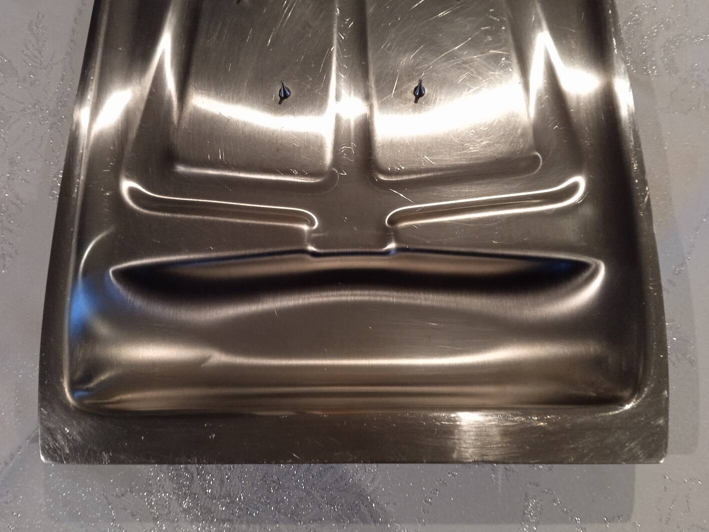 Stainless steel lamb dish