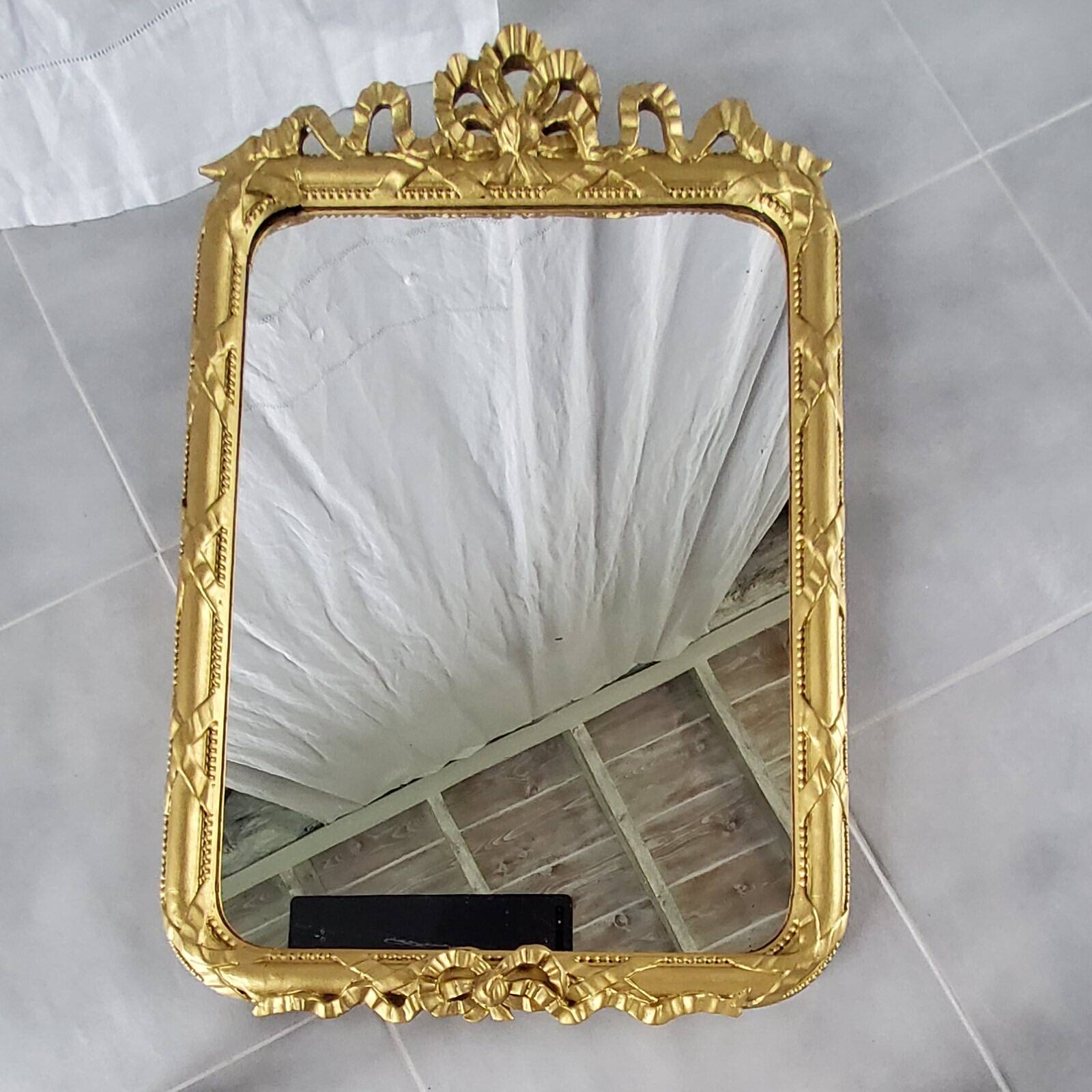 Miroir doré 64x43cm
