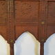 Carved wooden window with rear support for possible mirror