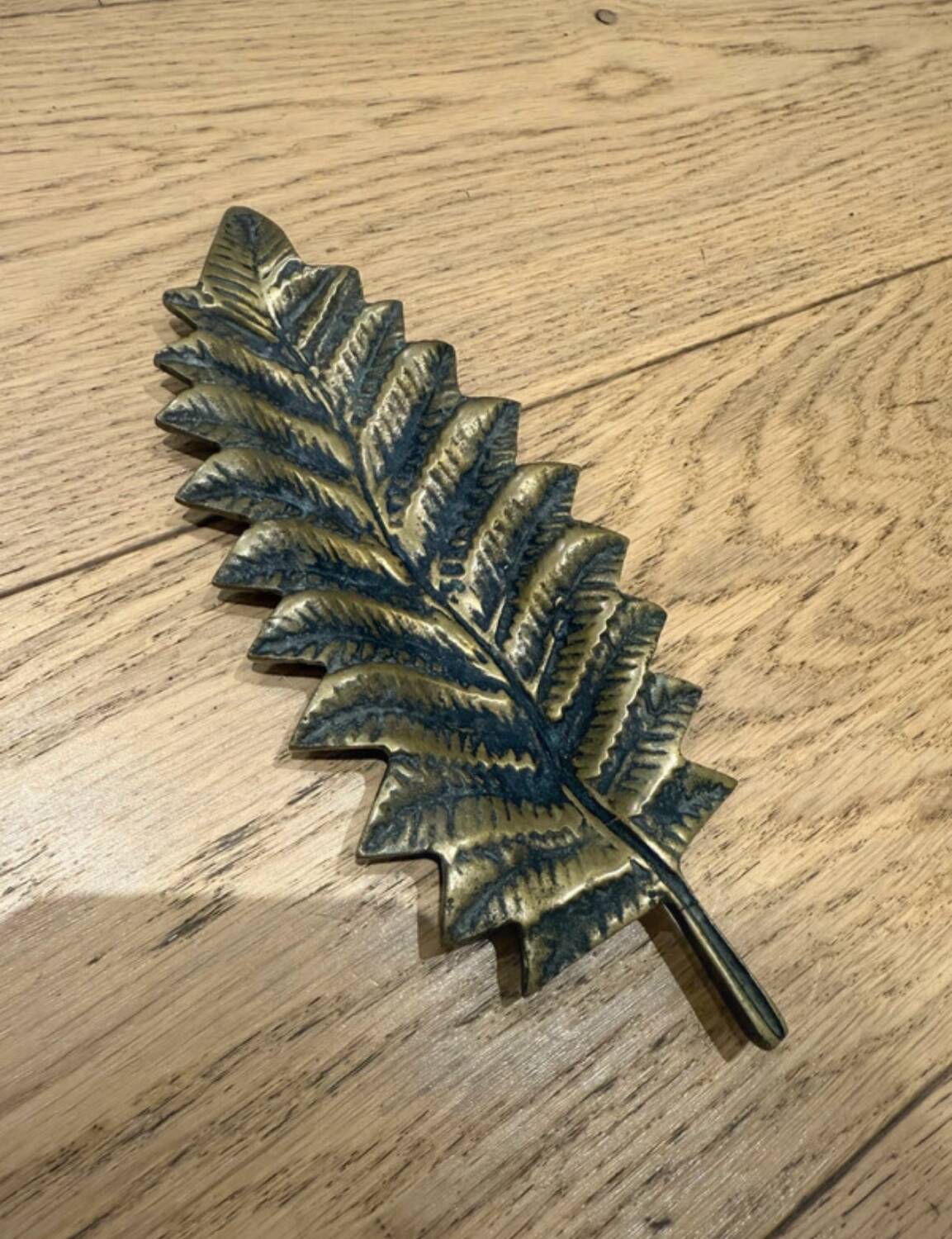 Brass pocket emptier