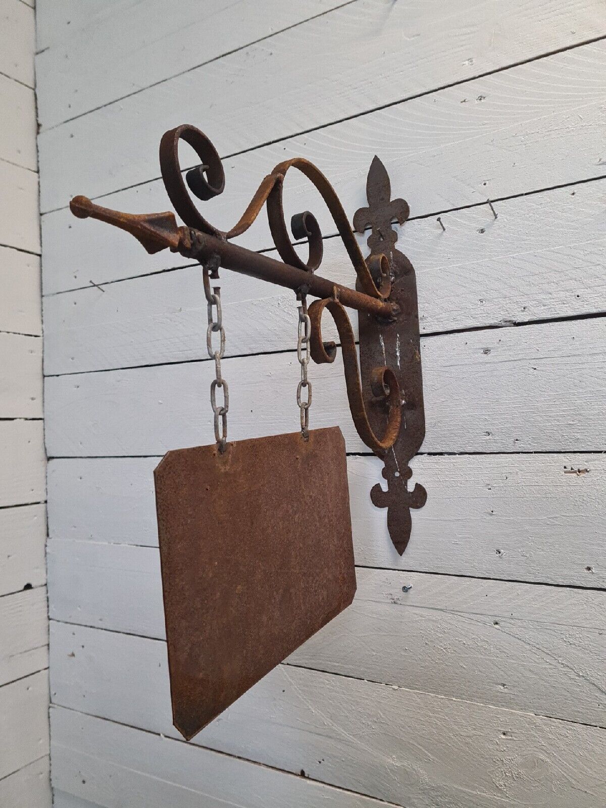 Wrought iron trade sign