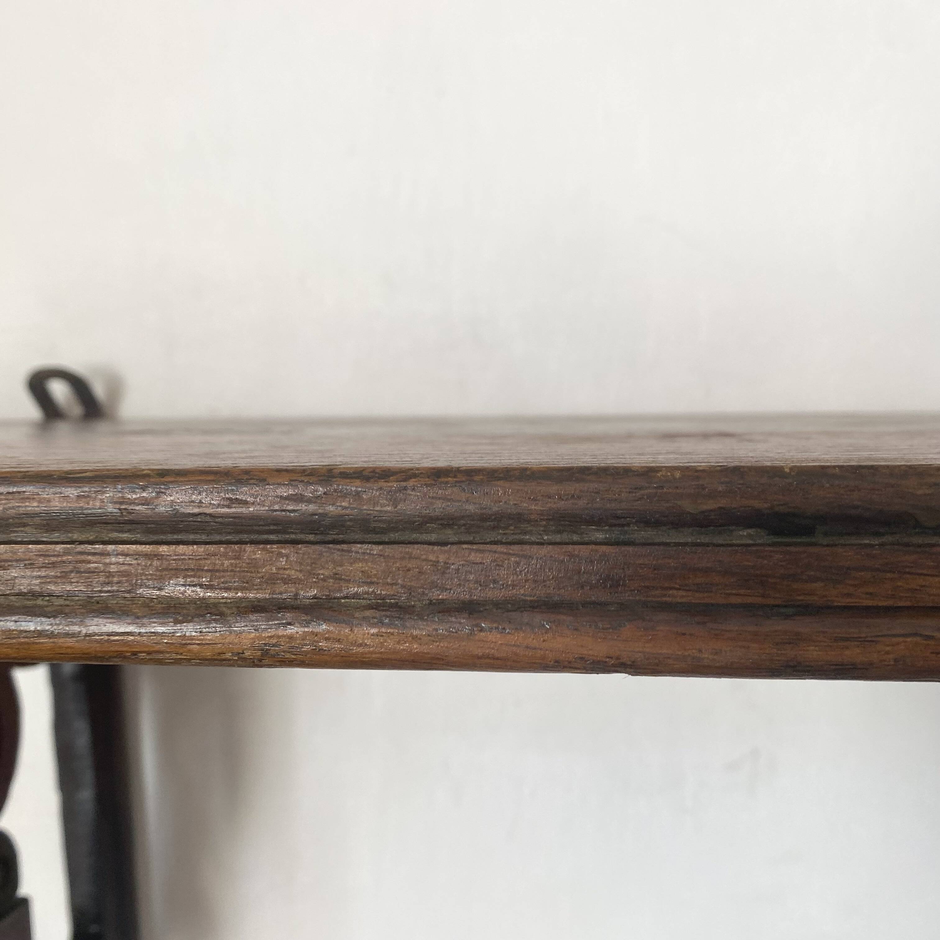 antique oak wall shelf with carved brackets