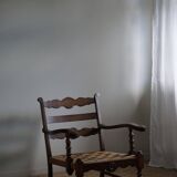A pair of modern and sculptural vintage Danish armchairs in oak and papercord, 1940s.