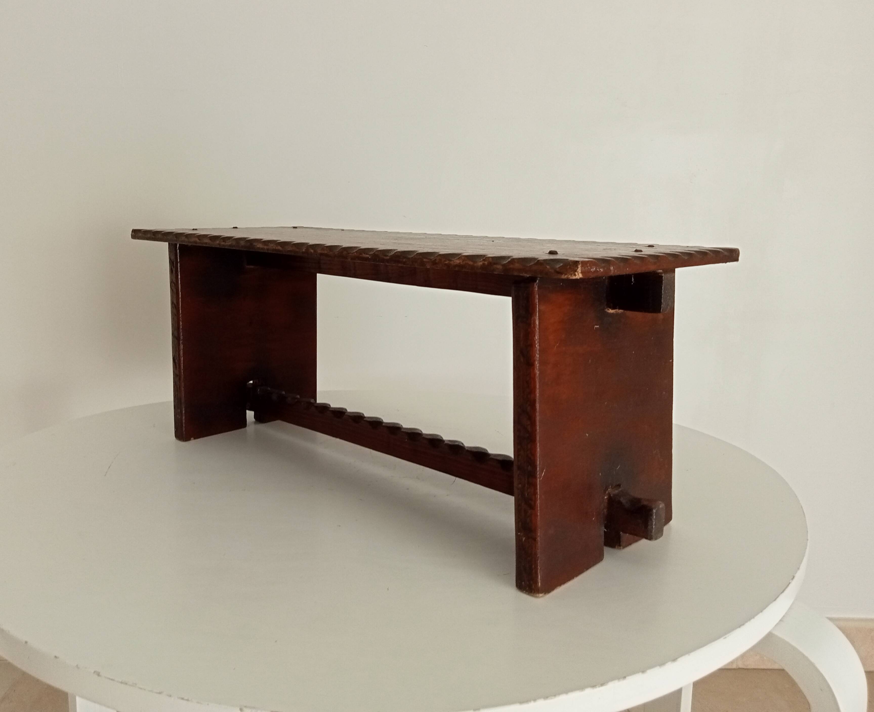 Low brutalist stool in the style of Charles Dudouyt.
