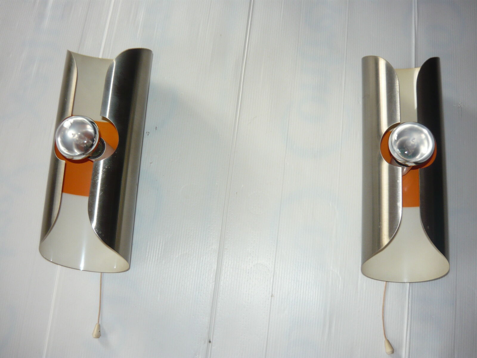 Pair of cylindrical stainless steel wall lamps space age years 70