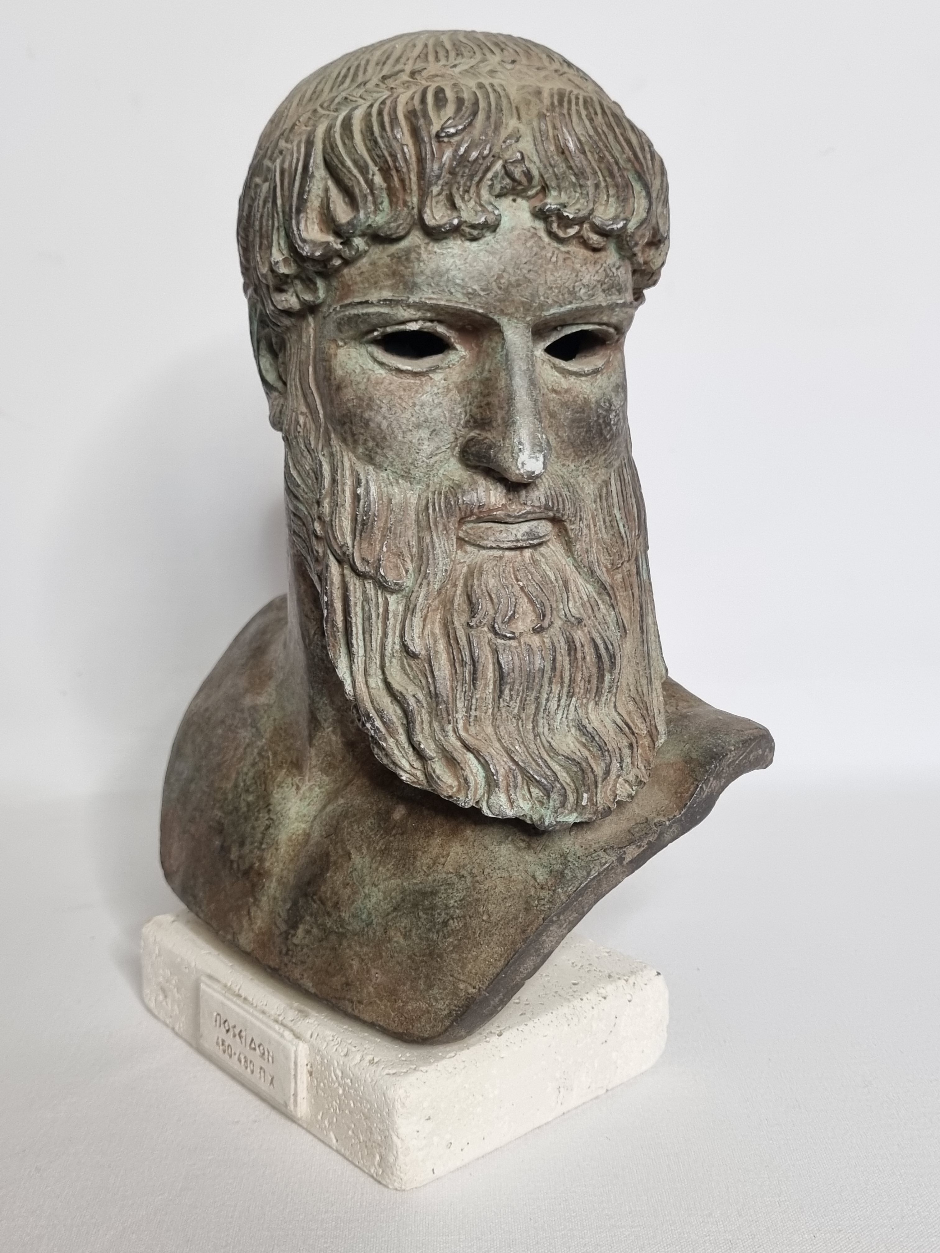 Bust of Poseidon in patinated plaster on plaster base,