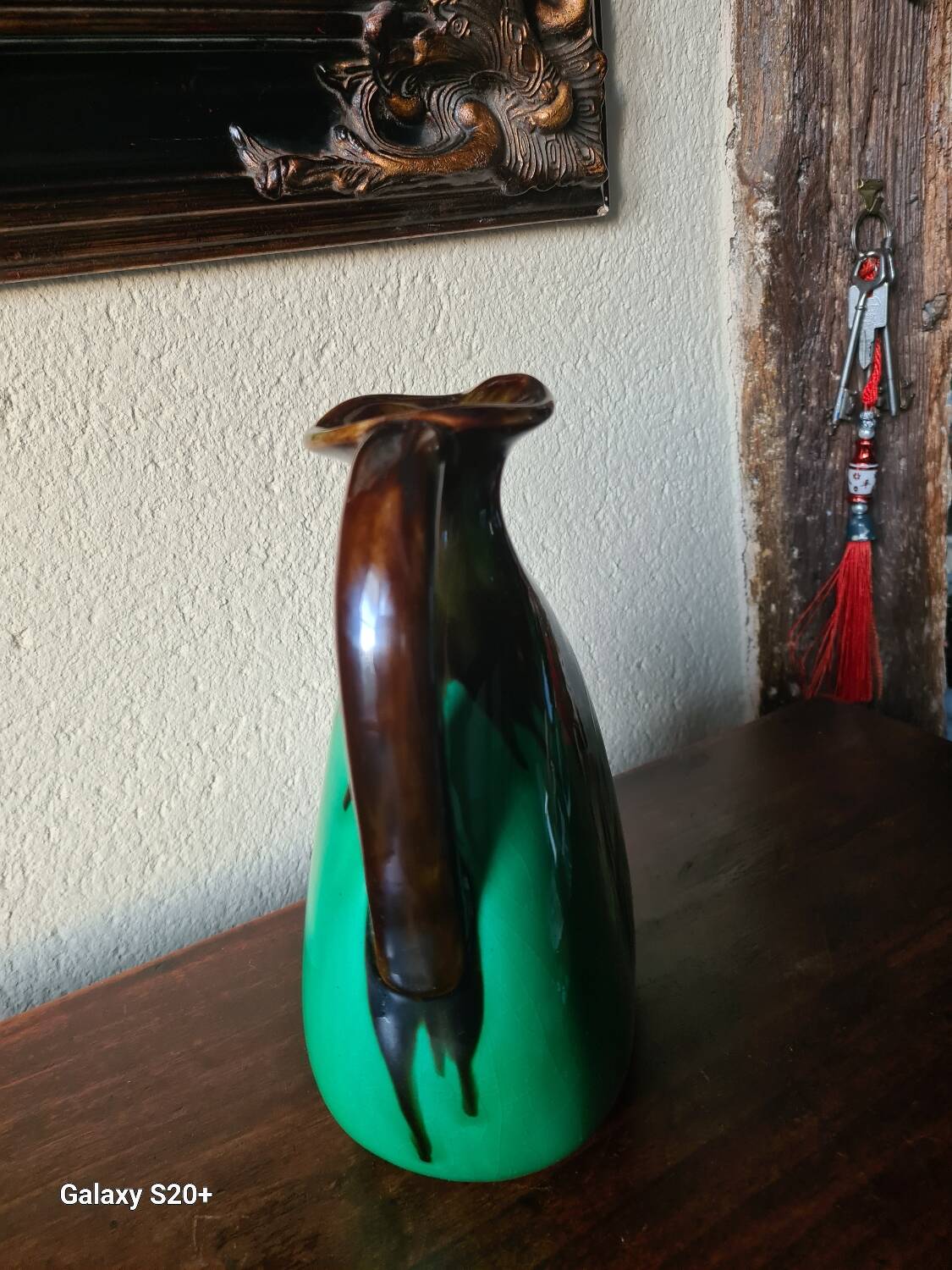 Green and brown ceramic vase