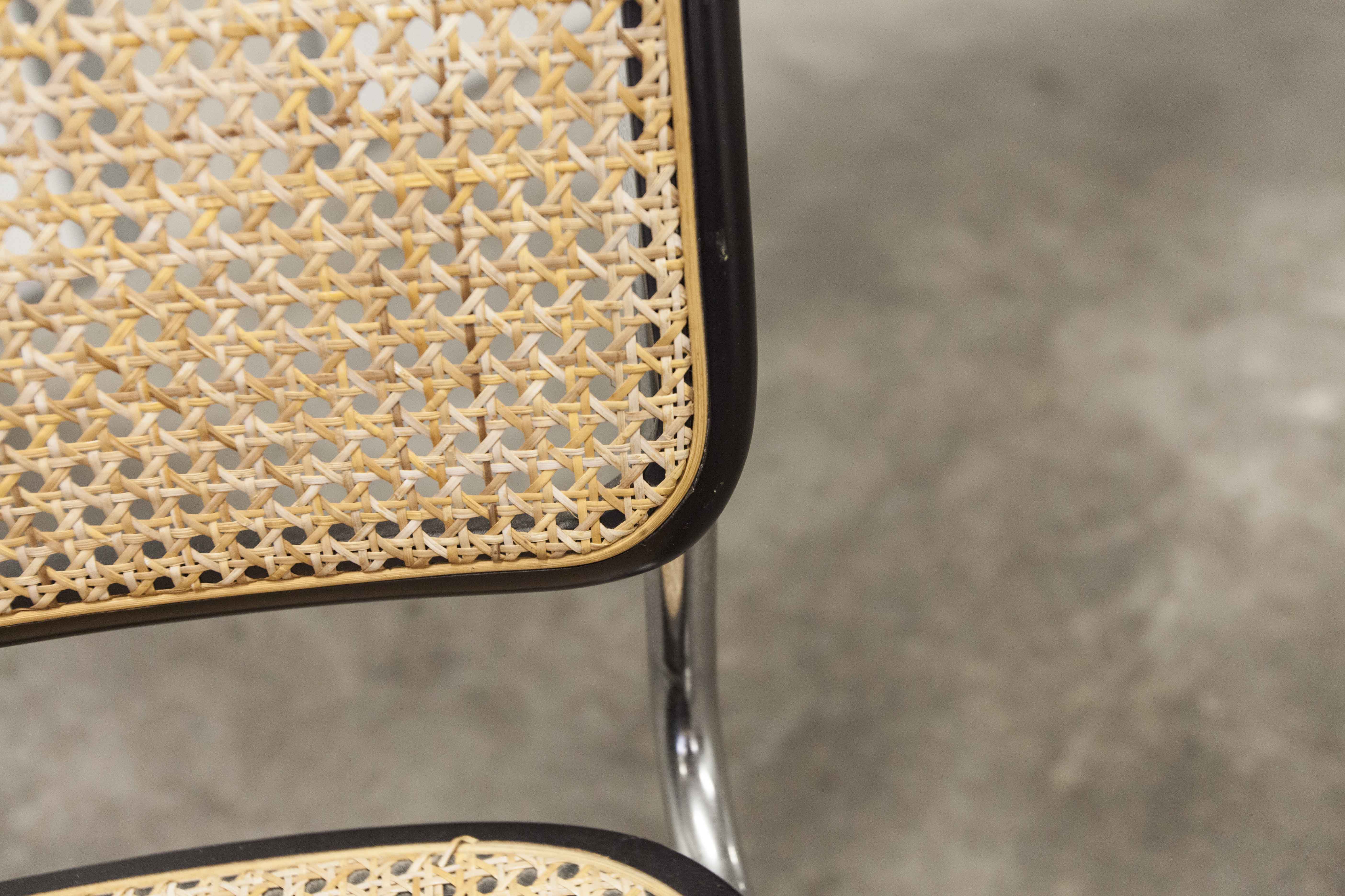 Pair of black Breuer b32 chairs and cannage