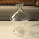 Old carafe in engraved glass vegetal decoration