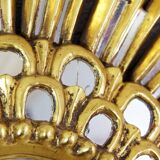 Sun mirror in wood and gilded stucco