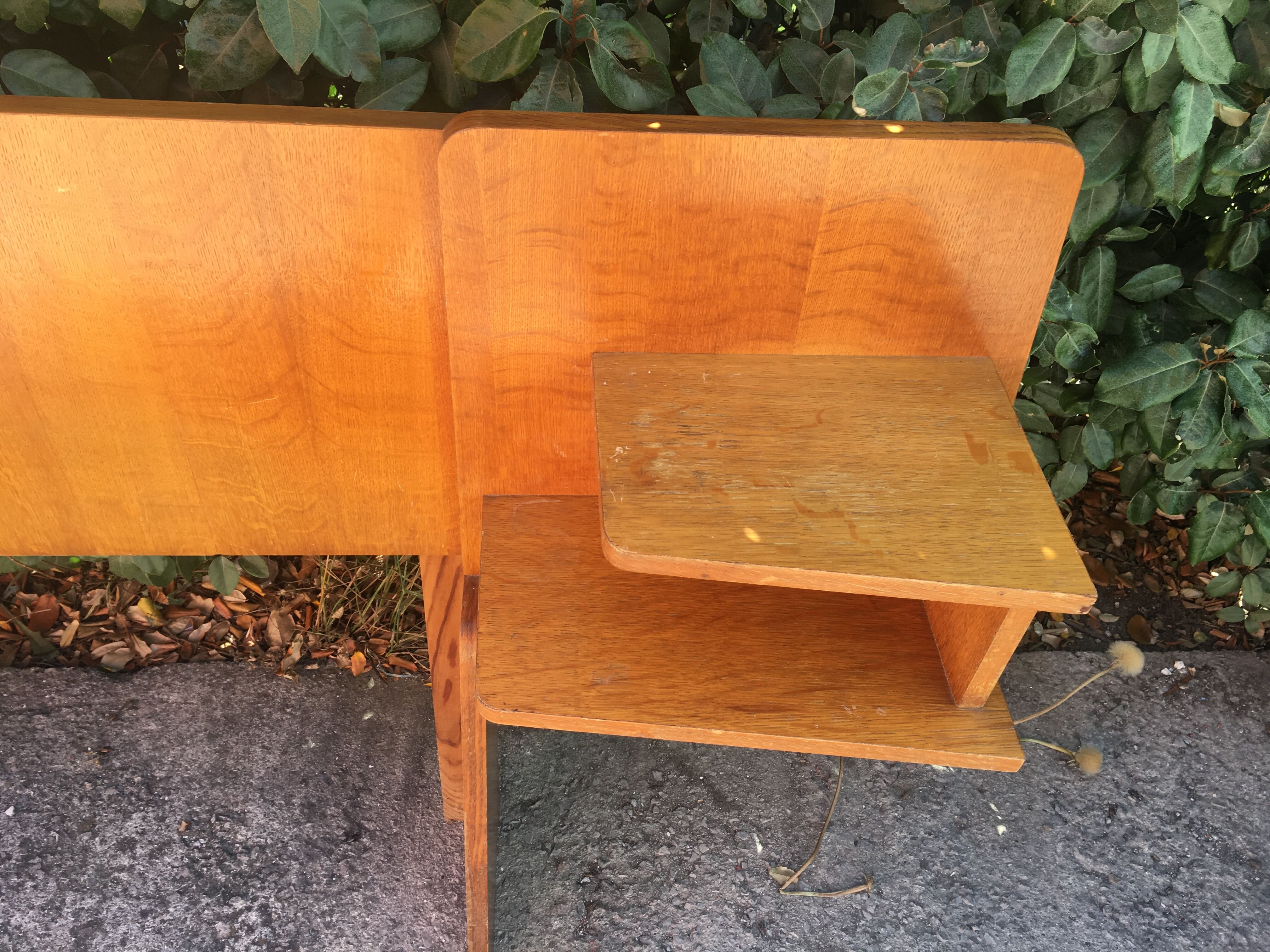 Vintage headboard with hanging bedside tables