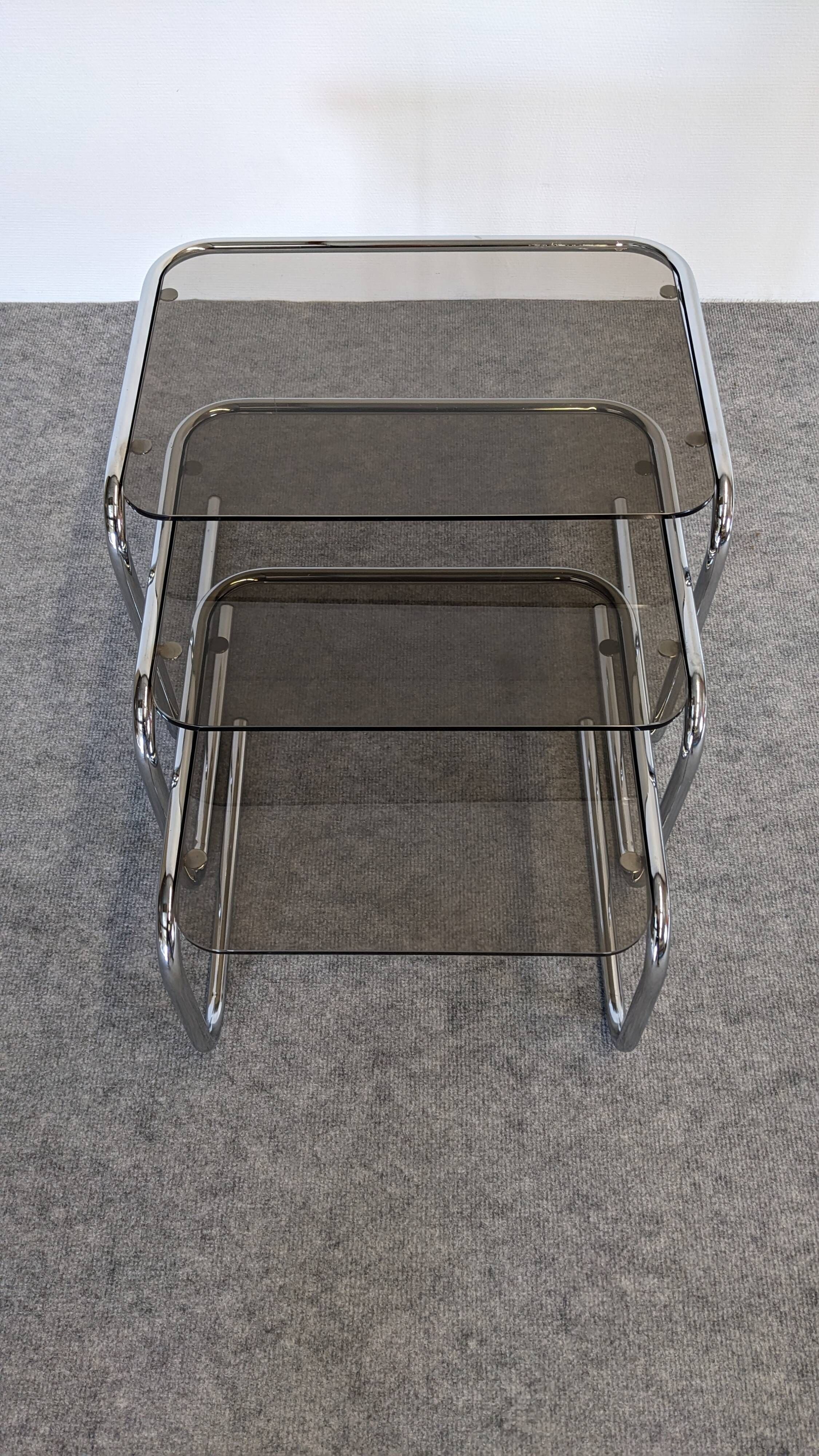 Nested tables with tubular chrome and smoked glass, France 1970.