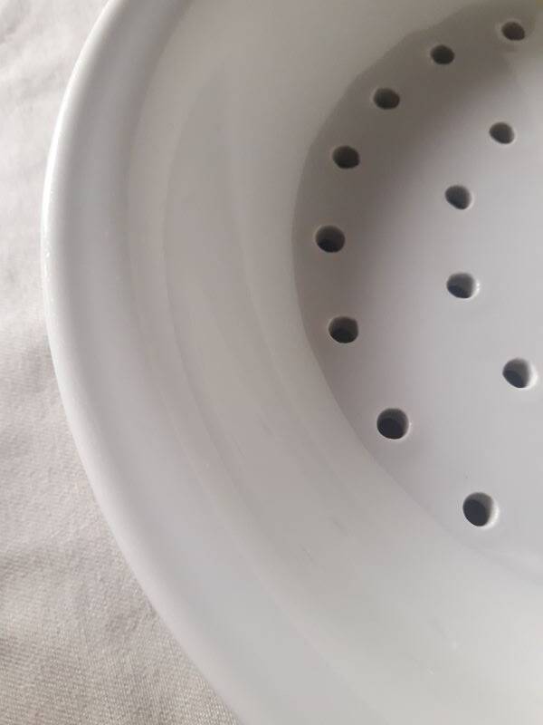 White porcelain drainer and dish
