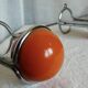 Vintage 1970s orange and chrome coat rack