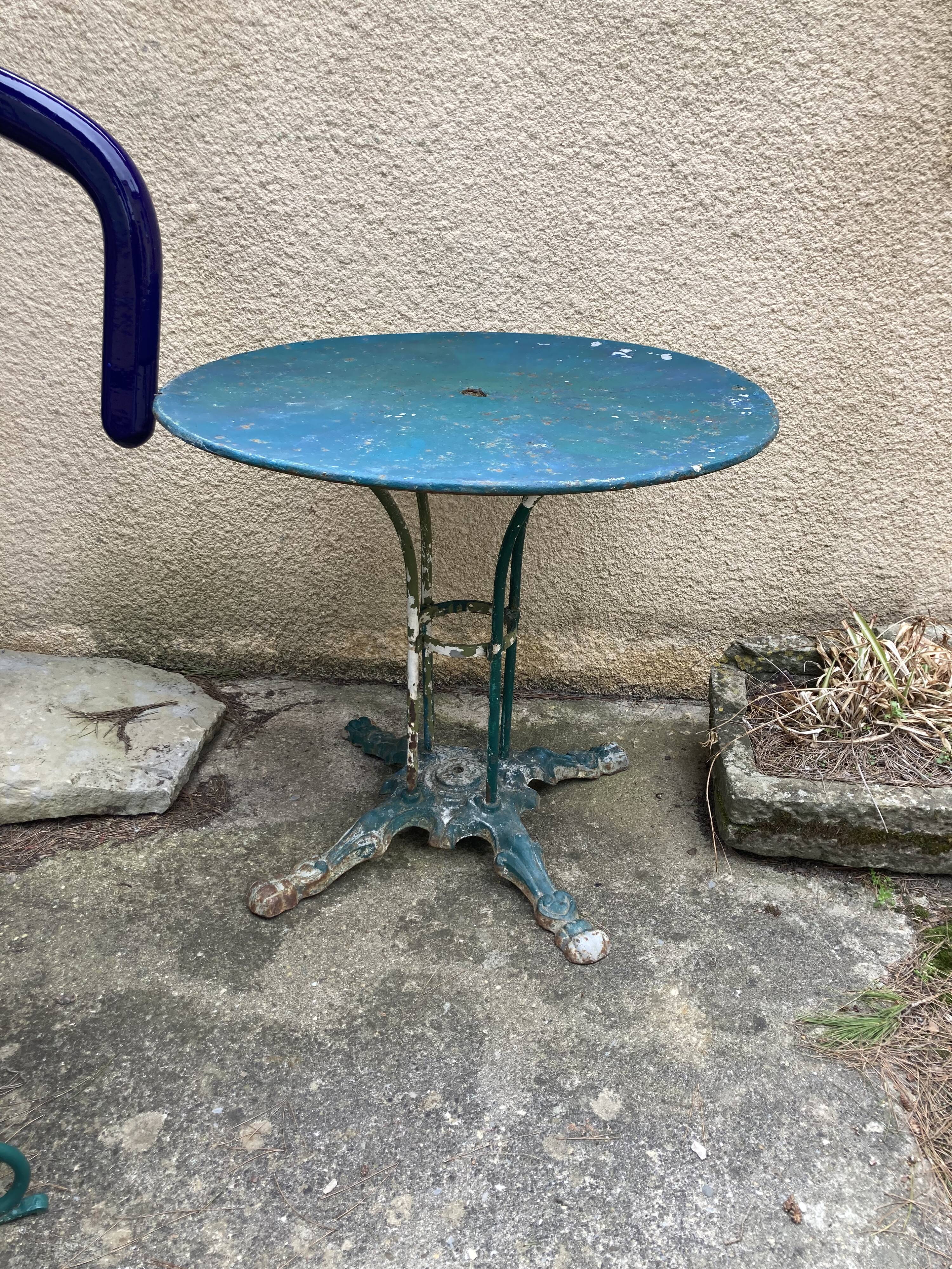 Old wrought iron garden table