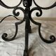 Pair of 3-light wrought iron candlesticks on vintage legs