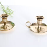 Duo of rat candlesticks in gilded brass