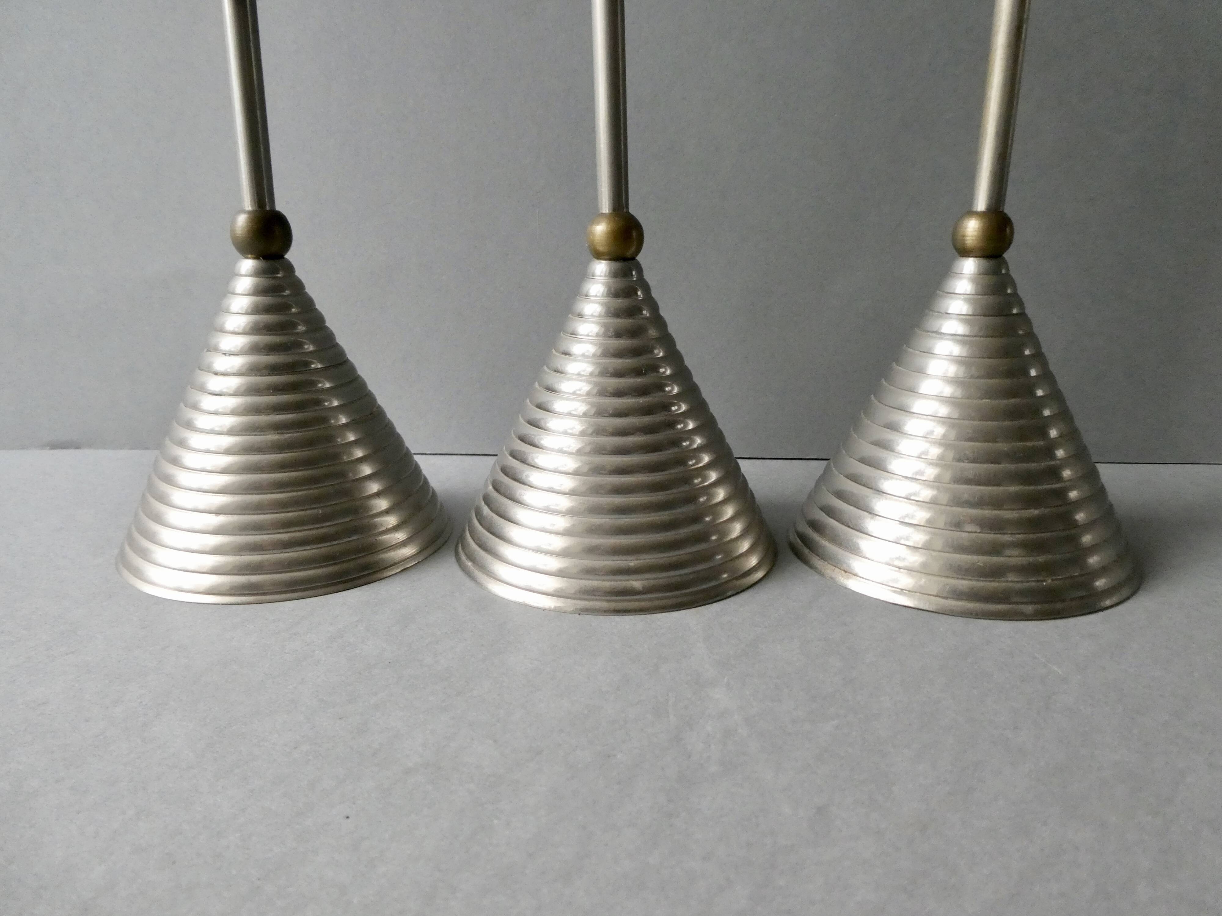 3 bougeoirs en métal argenté et doré