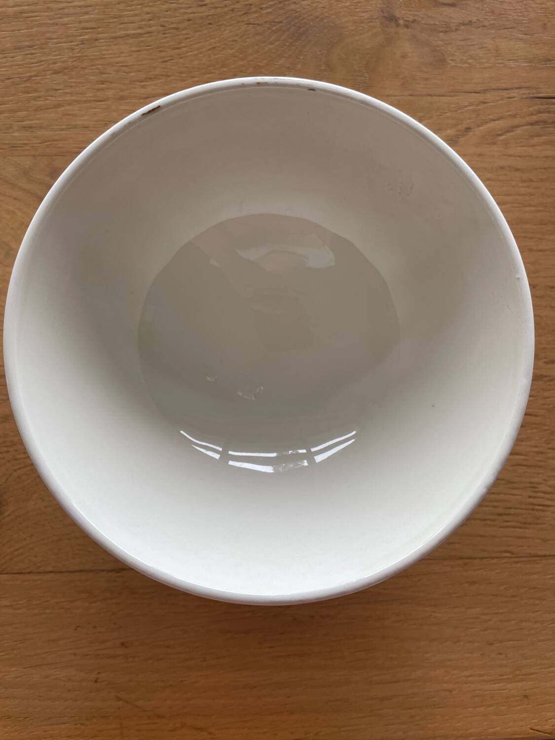 Antique bowl with burgundy and white checks