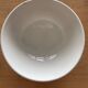 Antique bowl with burgundy and white checks