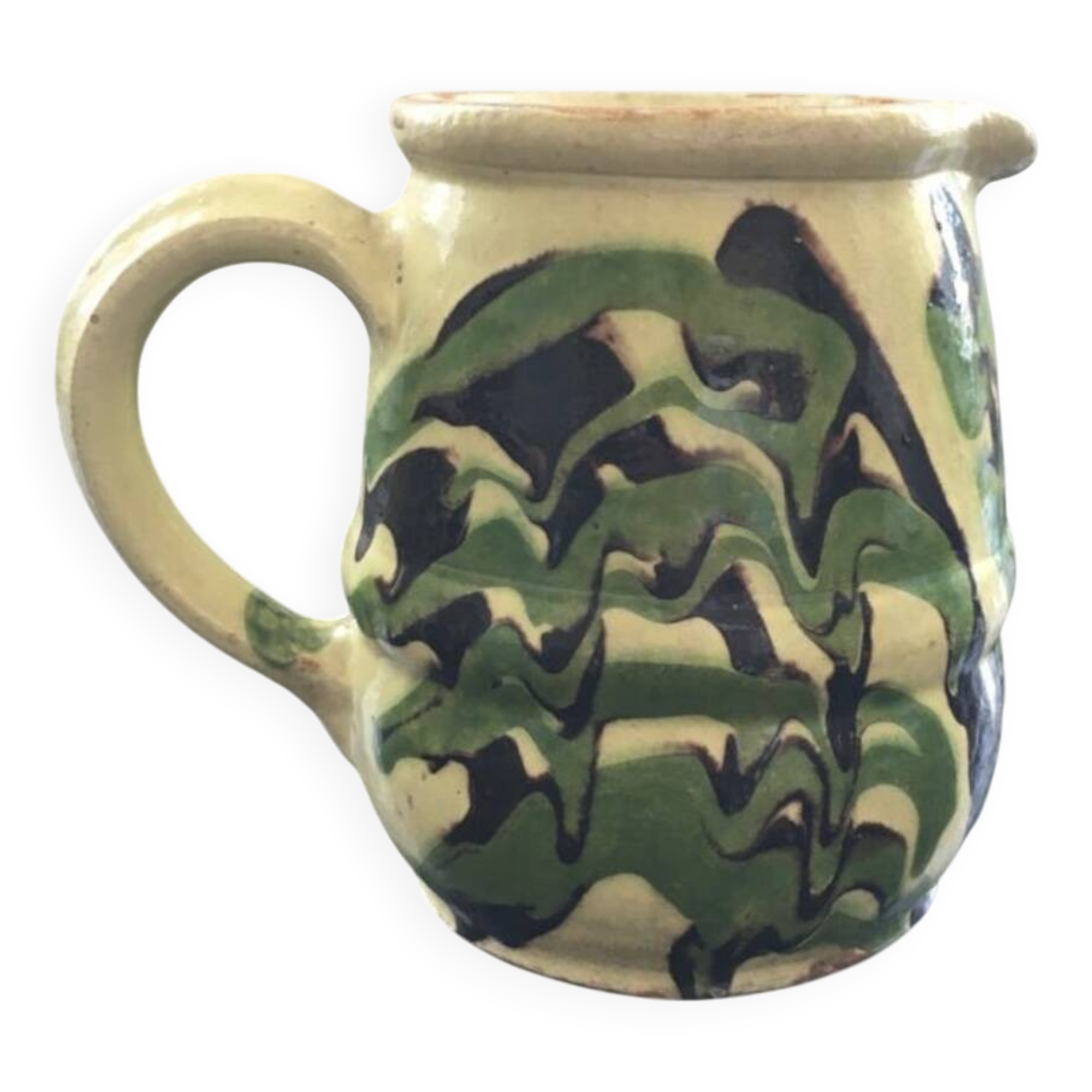 Antique pitcher of mixed earth