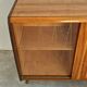 Mid-Century Modern walnut buffet with two compartments.