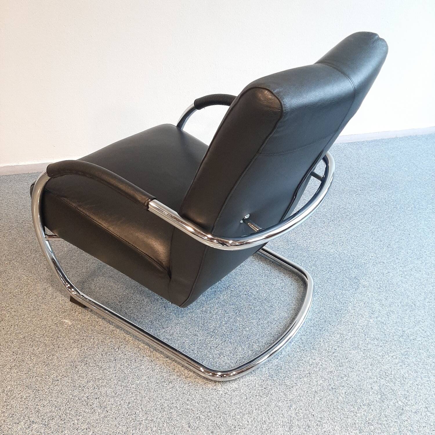 Pair of tubular armchairs