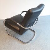 Pair of tubular armchairs