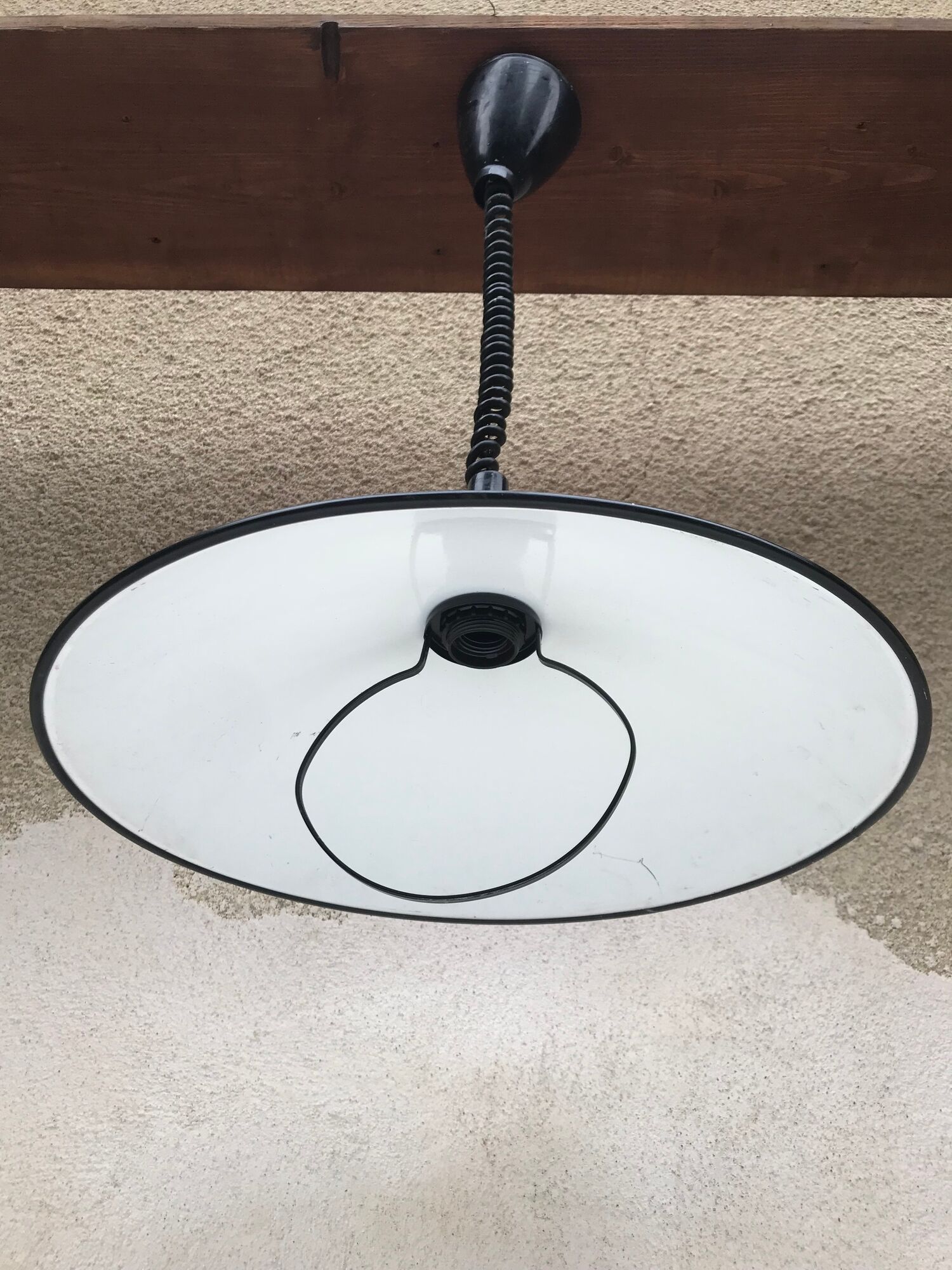 Old red metal suspension lamp from the 70s