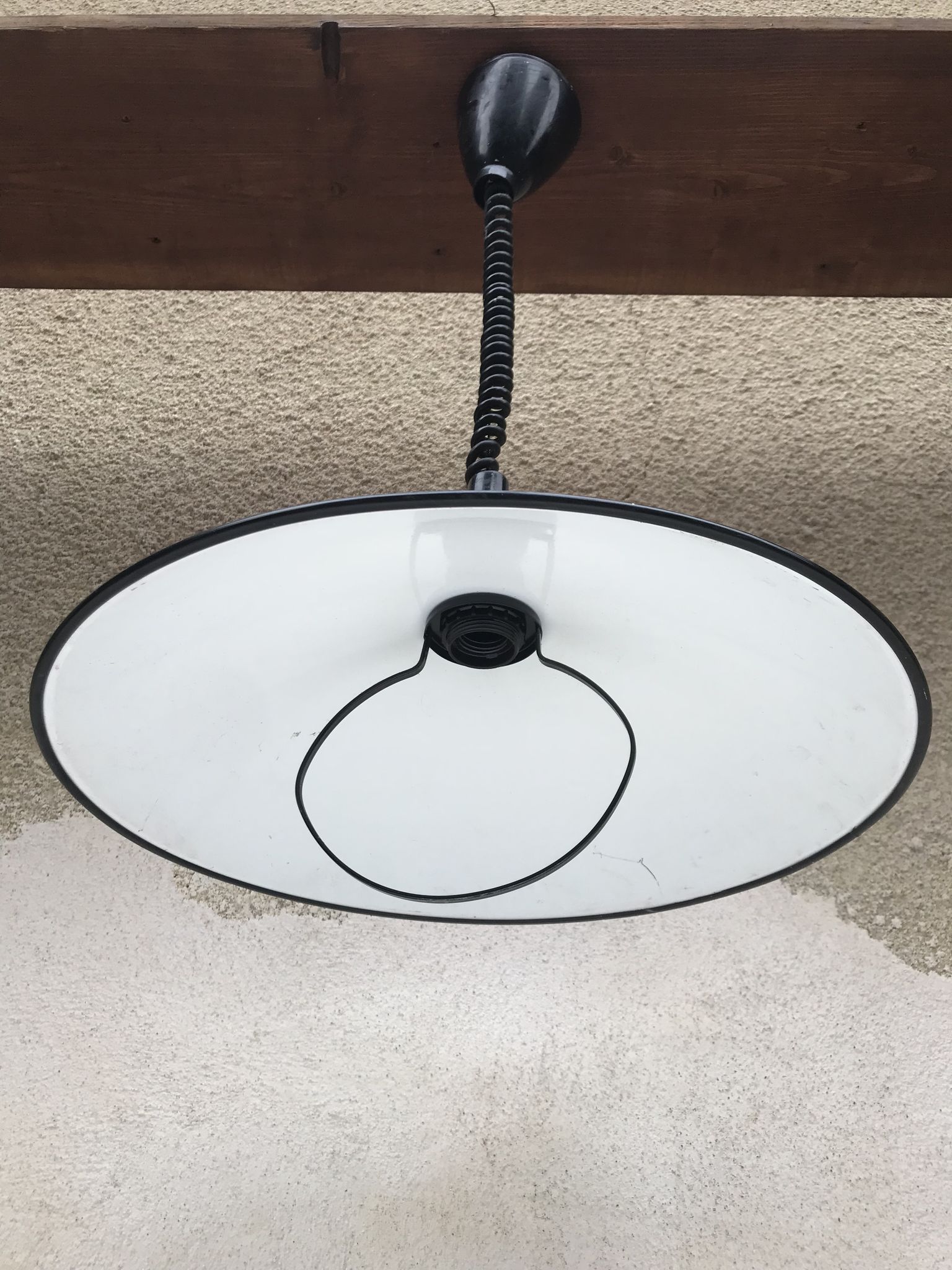 Old red metal suspension lamp from the 70s