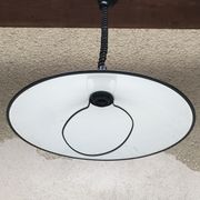 Old red metal suspension lamp from the 70s