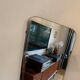 Asymmetric mirror with wood frame, 1960s