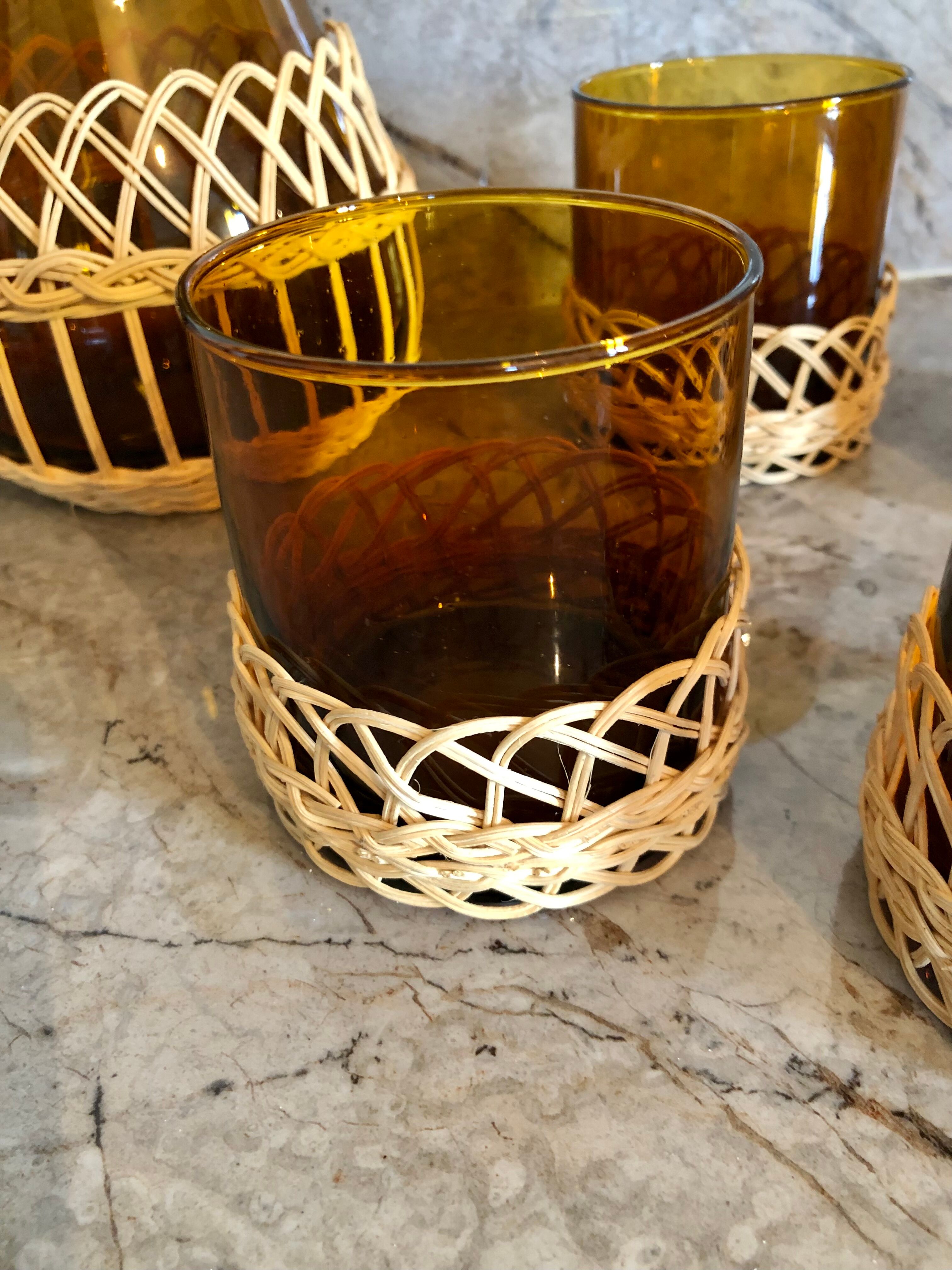 Pitcher and amber glasses and rattan