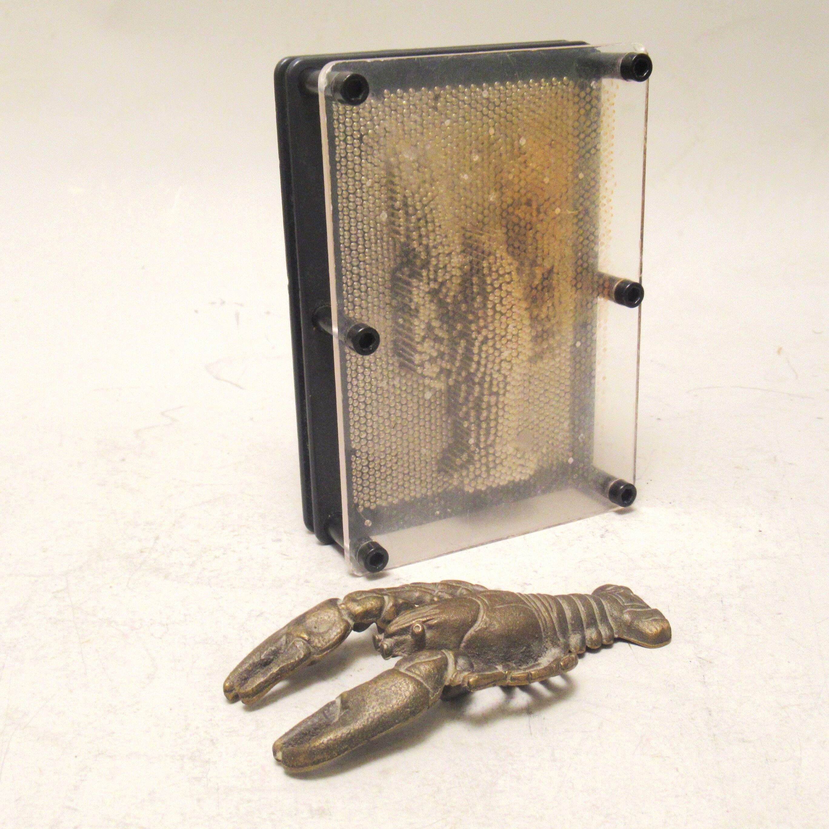 Sculpture screwweight in bronze