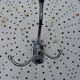 Wall-mounted coat rack in chromed metal with 4 adjustable hooks