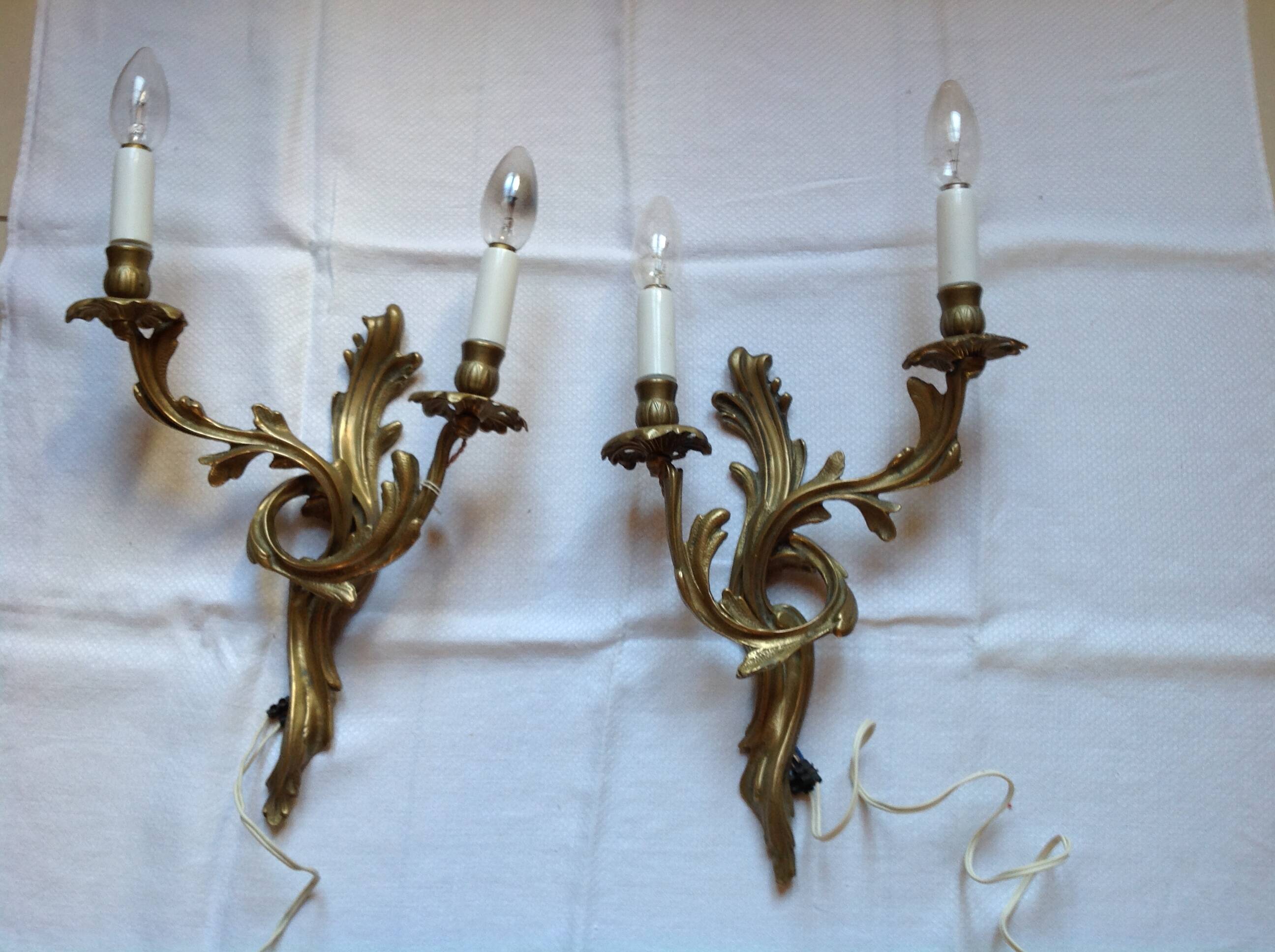 Pair of antique bronze wall lights, early 20th century